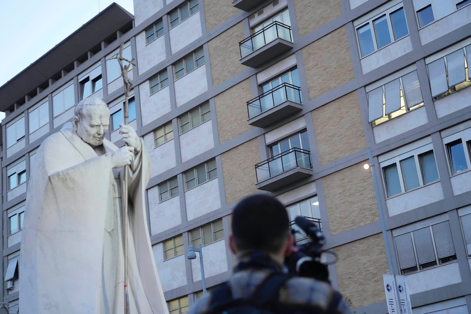 Photo: A video journalists films the Agostino Gemelli Polyclinic in Rome, Sunday, February 23, 2025, where Pope Francis is hospitalized since February 14.