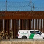 Photo: Members of the Texas National Guard guard near the border wall between Mexico and the United States, as seen in Ciudad Juárez, Mexico, January 14, 2025.